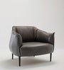 The Grandiose Tufted Berg re Chair with black metallic legs brings luxury to living rooms, bedrooms, or dressing areas. Its tufted upholstery and elegant design offer both comfort and sophistication.